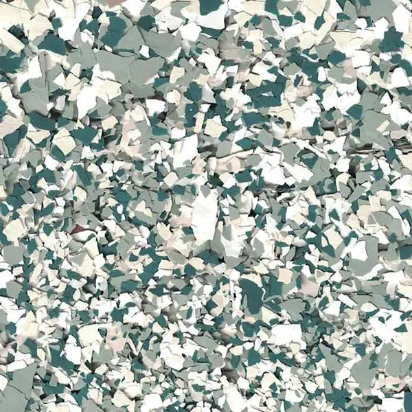 The image shows a close-up of camouflage fabric with a pattern of green, gray, and white irregular shapes, resembling military or outdoor gear.