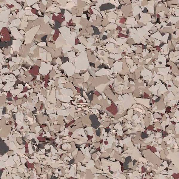 The image shows a close-up of a textured surface featuring a mix of beige, white, and dark speckled patterns.