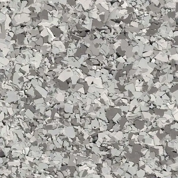 The image shows a close-up view of numerous small gray stones or gravel, creating a textured surface without discernible people, landmarks, or buildings.