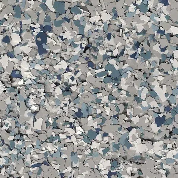 Abstract image featuring a mix of small, irregularly shaped pieces in muted blue, gray, and white shades, resembling a mosaic or camouflage pattern.