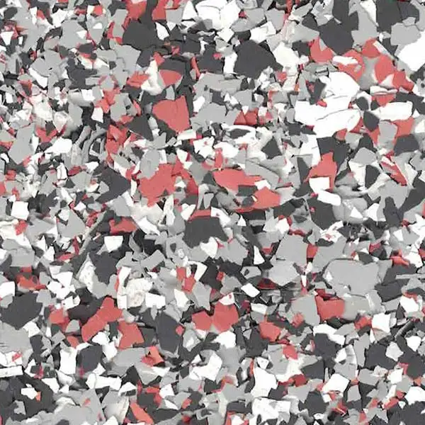 The image shows a colorful, abstract pattern composed of variously sized chips in shades of red, grey, black, and white. No landmarks visible.