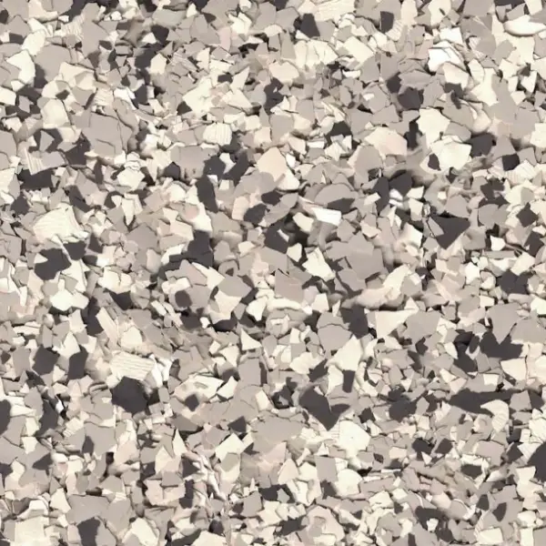A textured surface of broken egg shells creates an abstract pattern with varying shades of white and gray, densely scattered throughout the image.