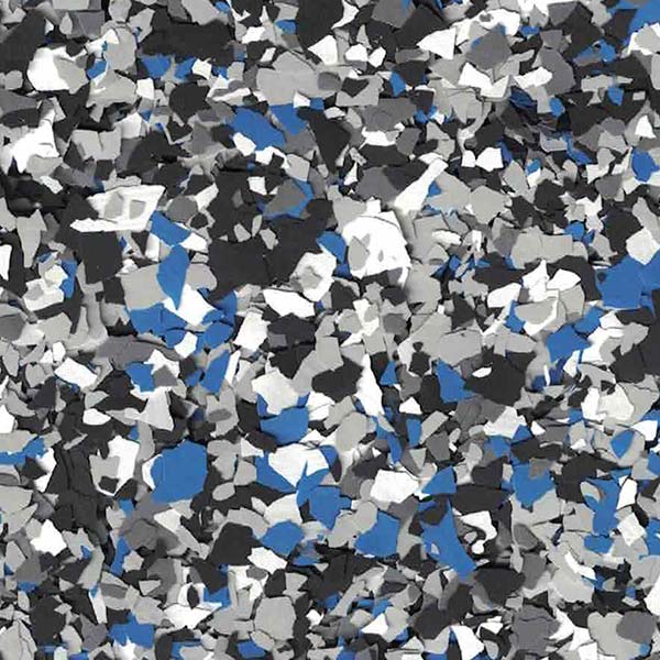 Abstract mosaic of irregular gray, black, white, and blue shapes.